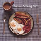 DOUBLE EGG WITH CHIPS AND BEANS (AND A TEA)