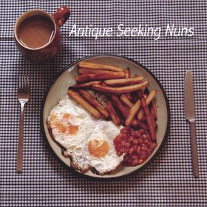 DOUBLE EGG WITH CHIPS AND BEANS (AND A TEA)