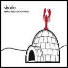 Shade - Arms Raised on Rooftops